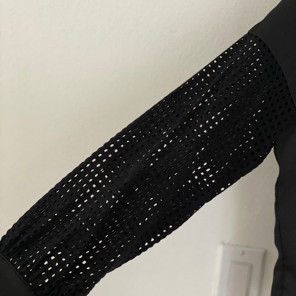 ALEXIS top with net sleeve design
